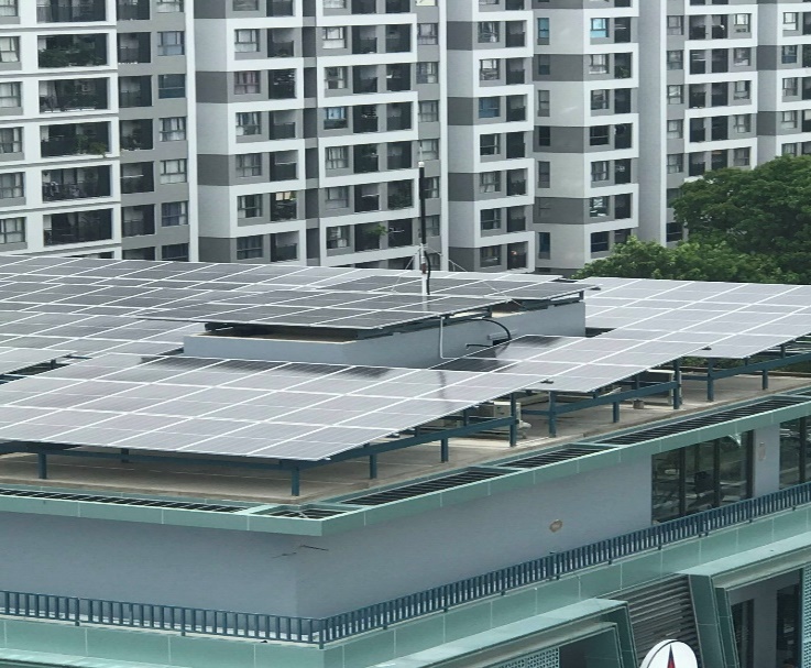A picture containing building, roof, apartment building

Description automatically generated